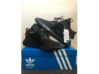 adidas tubular rise triple black